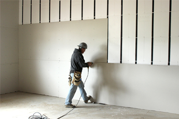 Efficient layout, panel installation, secure fastening, and smooth finishing for effective space division.