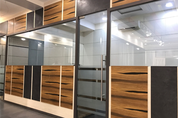 Elegant glass and wood partitions, seamless integration, and design options for a sophisticated look.